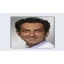 DR. ARYA EDALAT Implante Dental em Santos SP